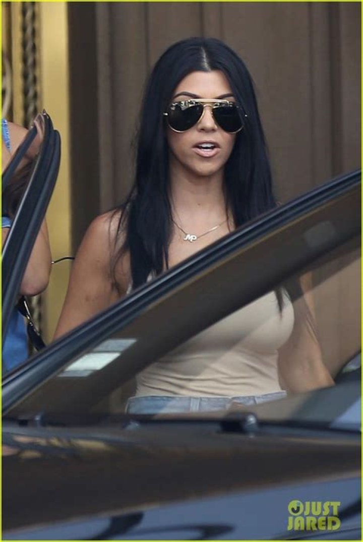 Kourtney Kardashian Shows Off Major Cleavage in Sheer Top – Plus See More of Her Most Risqué Outfits