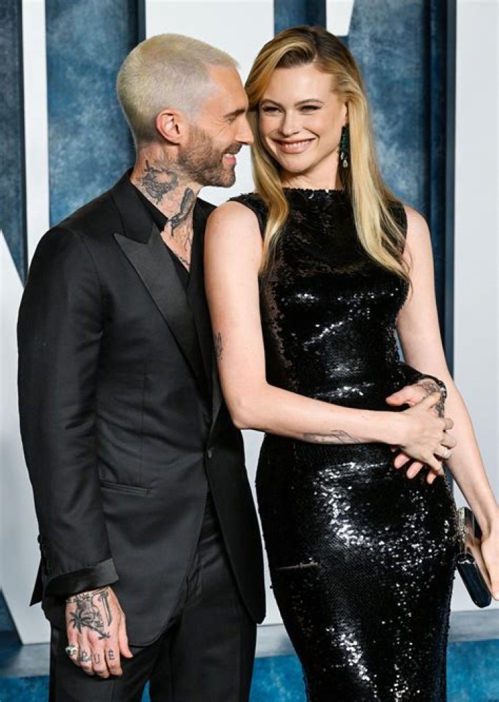 Maroon 5’s Adam Levine and Wife Behati Prinsloo Look Loved Up During Rare Appearance: Photos