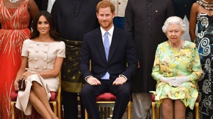 Watch Meghan Markle Effortlessly Fix Her “Duchess Slant” During an Outing With Harry and the Queen